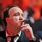 US actor Jim Belushi smokes a Habano cig